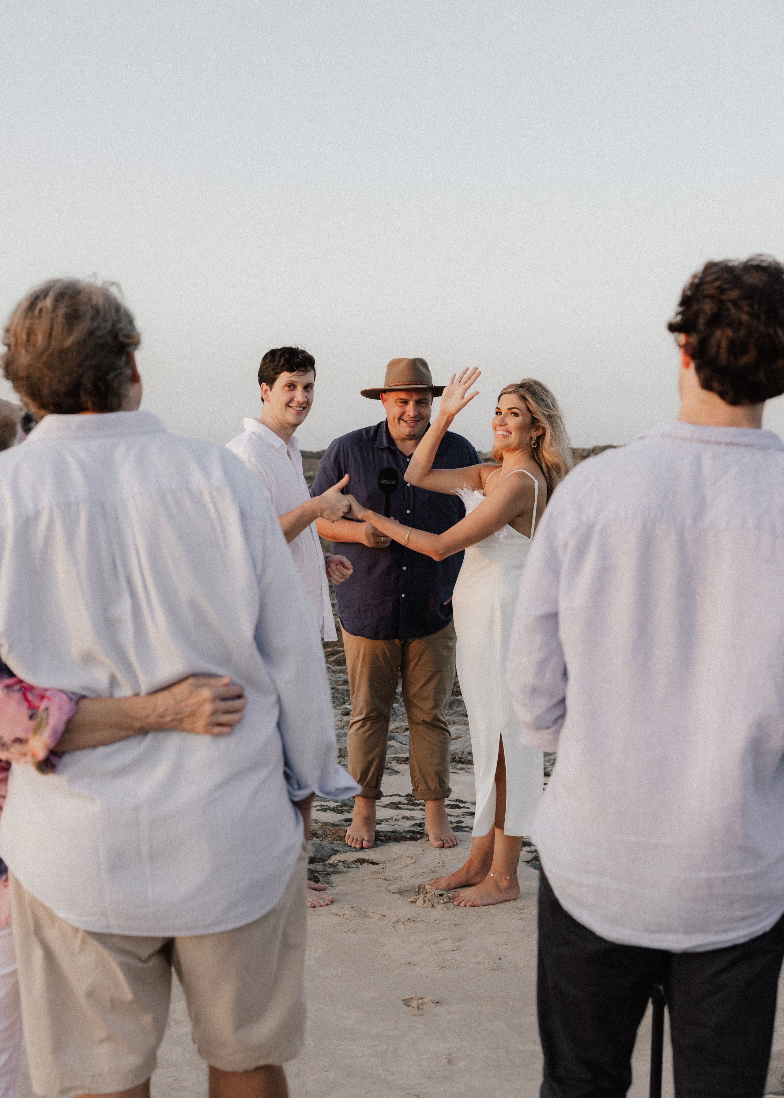 Josh Withers conducting a beach wedding ceremony on the Gold Coast