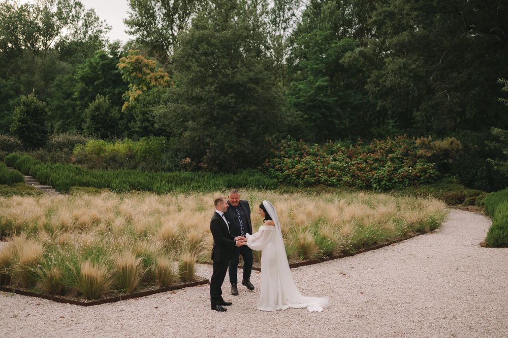 Nayla carrying her wildflower bouquet before the ceremony in Umbria