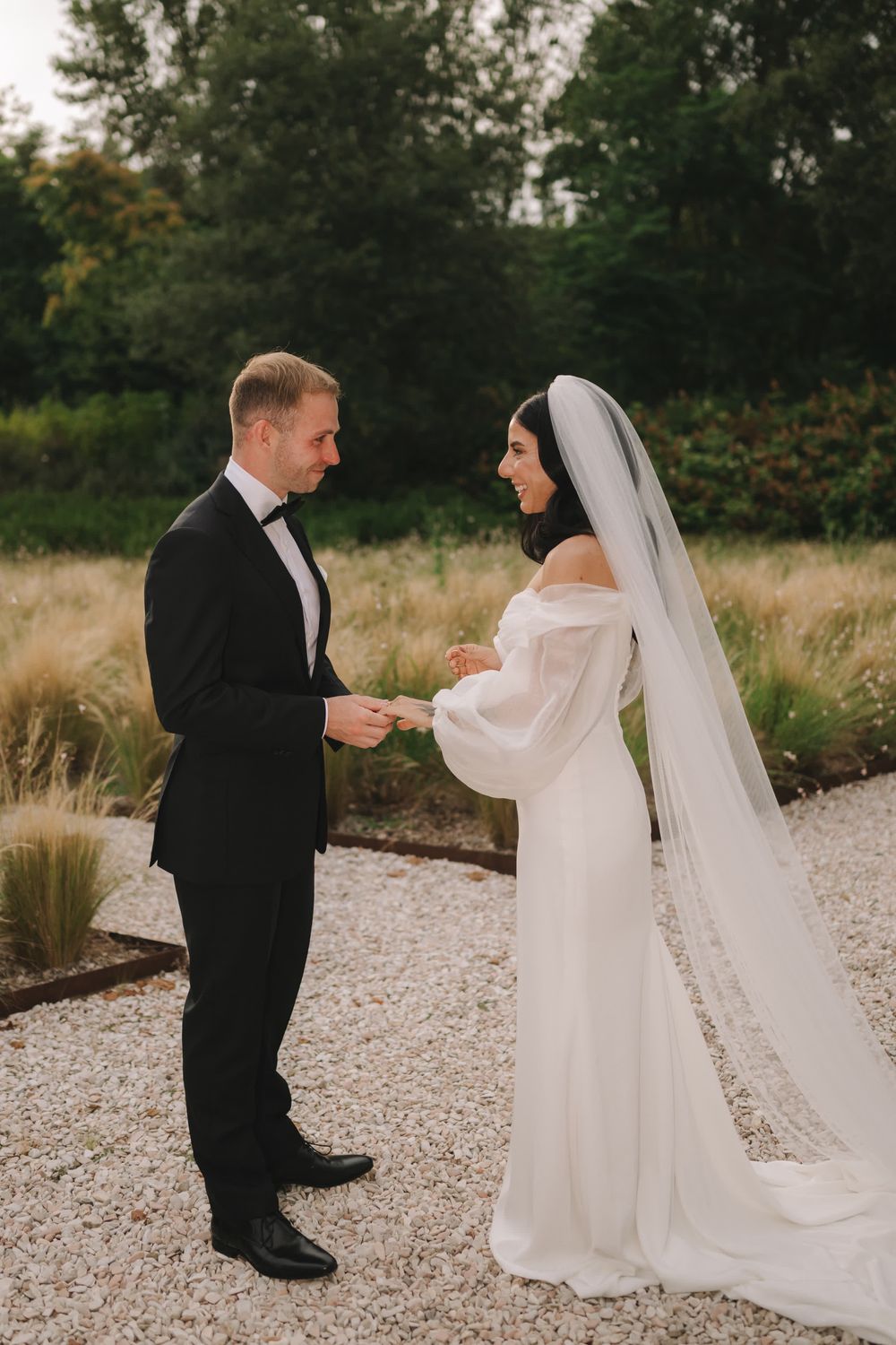 A close moment from Harry and Nayla’s garden elopement ceremony in Umbria