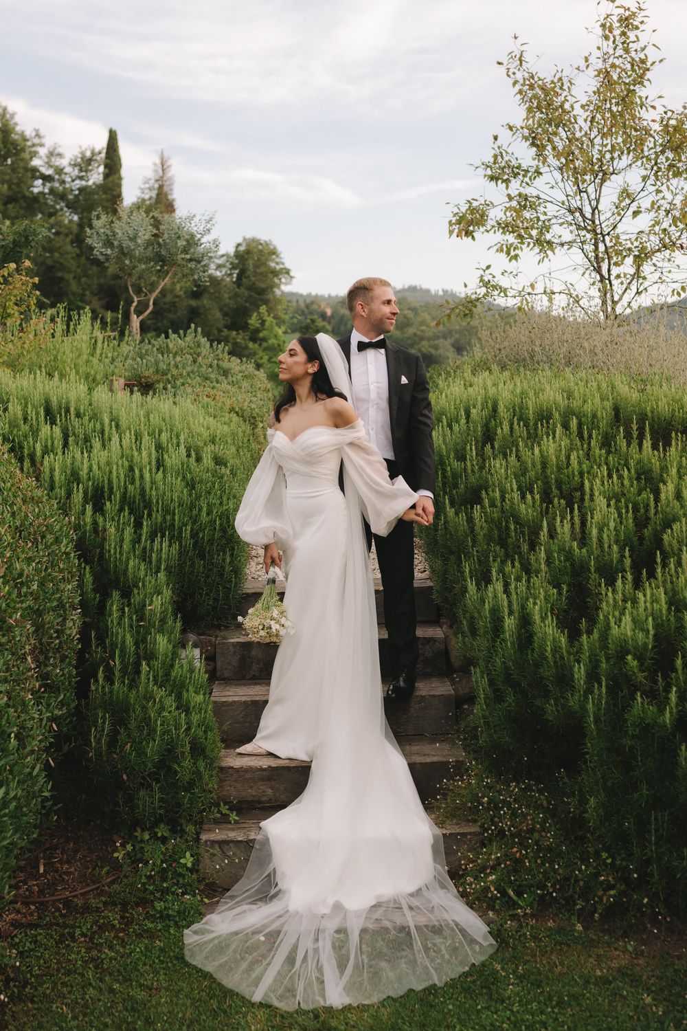 Harry and Nayla walking through the lush gardens at Vocabolo Moscatelli