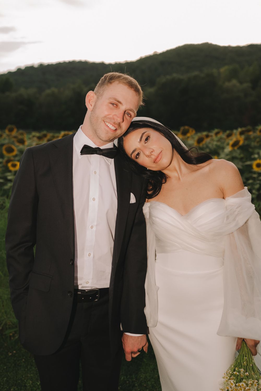 Harry and Nayla walking through the gardens after their Umbria ceremony