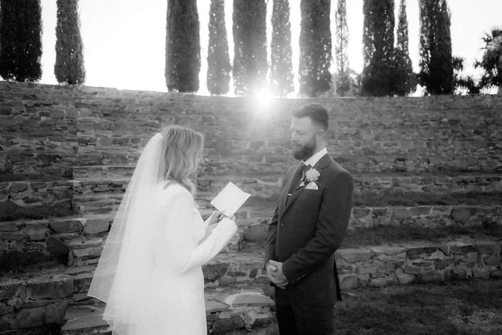 Black and white photograph of Kaitlyn reading her vows to Russell in Piermont’s amphitheatre